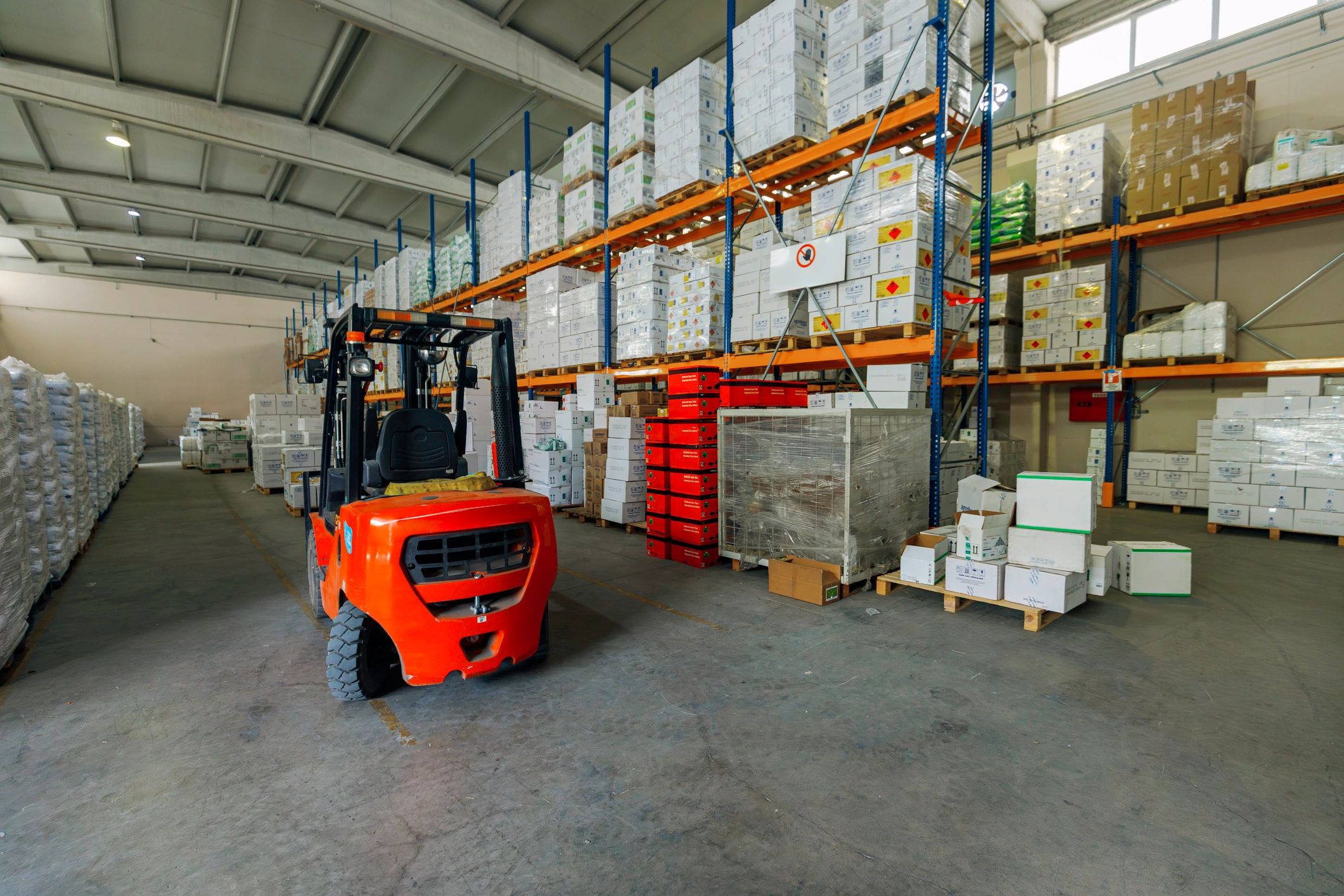 Warehouse aisle representing supply chain and storage operations