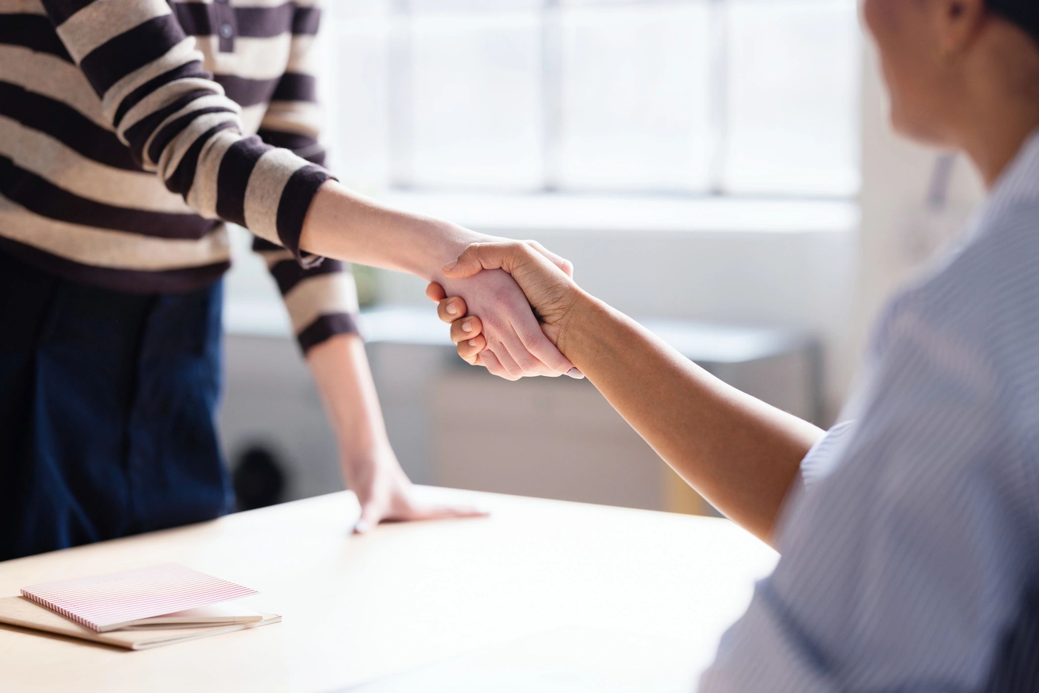 Business handshake representing trust and professional agreements